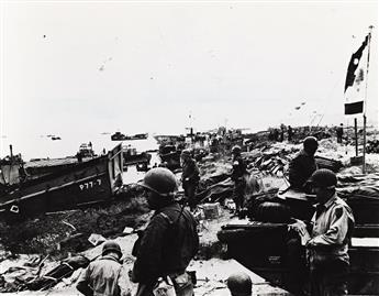 (WWII) A selection of 5 photographs documenting the Allied D-Day landing and its aftermath.